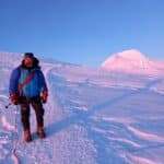 a man standing on a mountain in Nepal trek organized by Nepal Yetiraj Treks