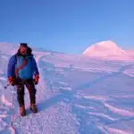 a man standing on a mountain in Nepal trek organized by Nepal Yetiraj Treks